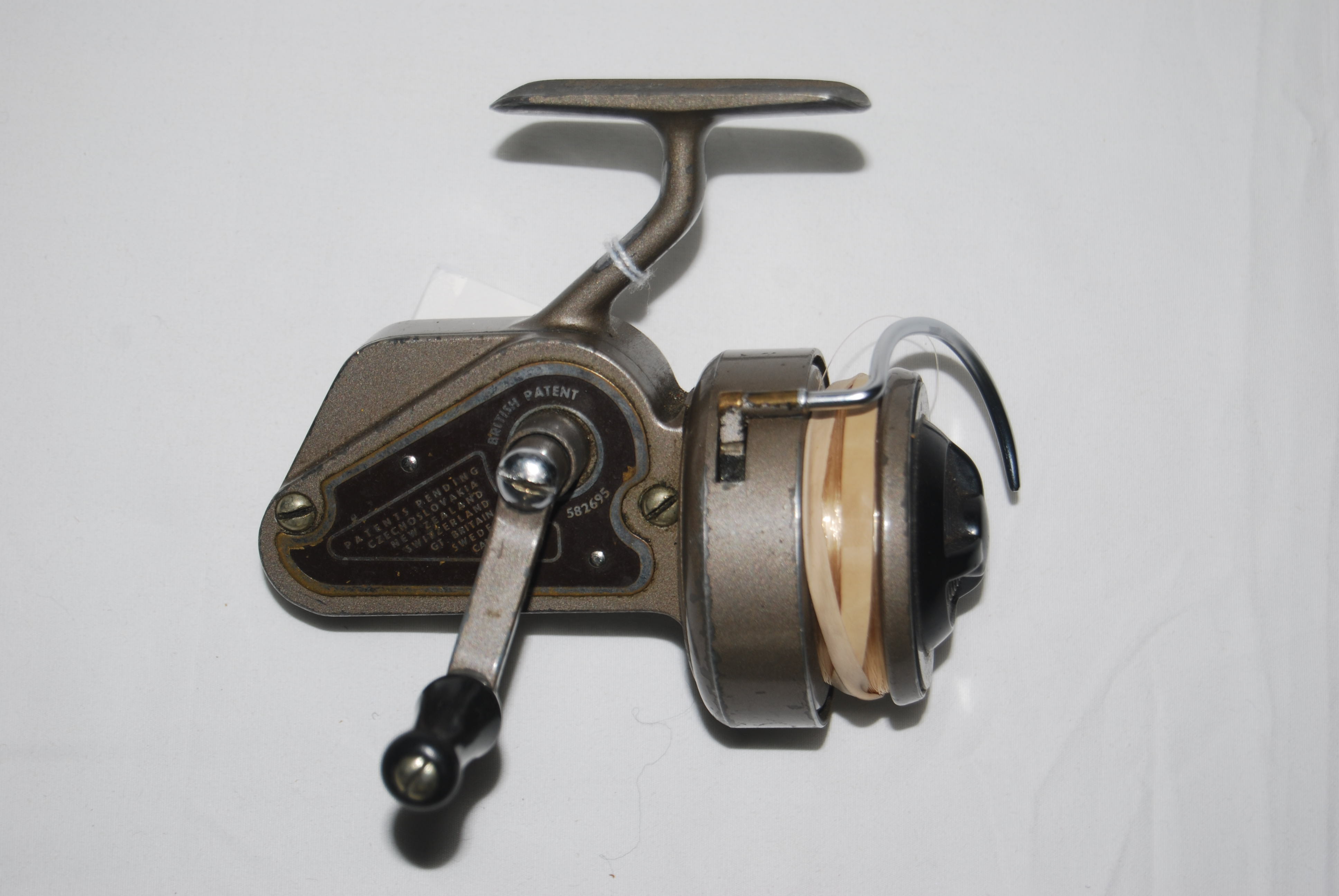J.W. YOUNG AMBIDEX No. 2 Spin Reel. LH/RH. Circa 1947. First spinning reel  to have a reversible handle, for use LH or RH. Half-bail. In cloth bag.